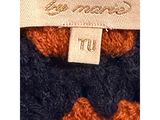 an image of a close up of a tie with a tag on it