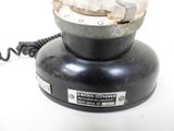 an image of a telephone with a cord attached to it