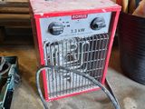 a small machine that is sitting on the floor