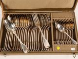 a lot of spoons and spoons in a box