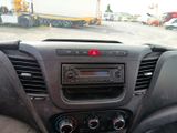 a dashboard of a car with a radio in it