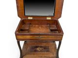 an old wooden desk with a mirror on top of it