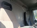 a view of the inside of a van from the driver ' s seat