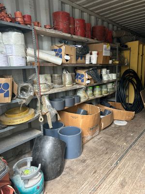 many pots and pans in the back of a truck