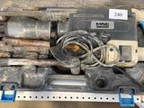 a tool in a case that is sitting on a table