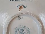 a white plate with a blue border on it