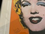 framed photograph of a marilyn monroe portrait in a black frame