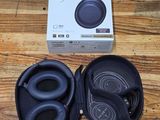 the sony headphones are in the box on the table