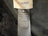 a close up of a label on a black jacket