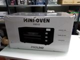 packaging for a mini oven sitting on a table in a store