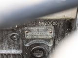a close up of a machine with a number plate on it