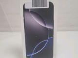the back of a box with a phone in it on a table