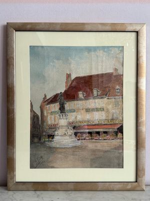 aquarelle encadrée représentant un bâtiment avec une fontaine devant
