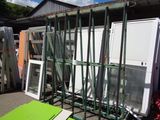 many different types of windows and doors in the yard