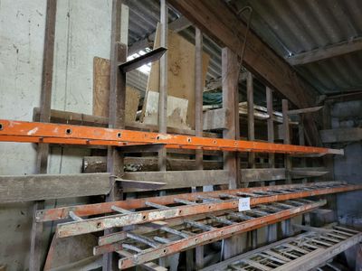 a room with a lot of shelves and a lot of shelves