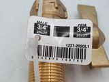 a close up of a brass ball valve with a barcode on it