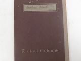 a brown book with writing on it sitting on a table