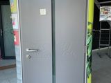 a refrigerator that has graffiti on the side of it