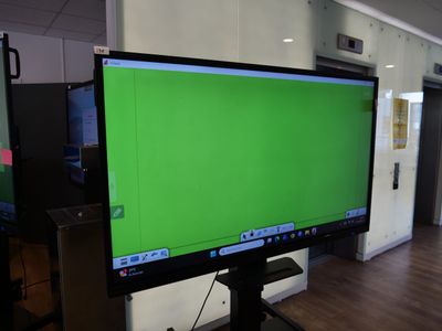 an image of a large flat screen tv with a green screen