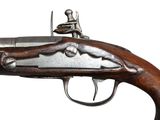 a close up of a gun on a white background with a white background