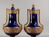 pair of royal blue and gold vases with gilded handles