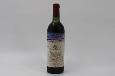 a bottle of wine that is sitting on a table