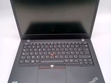 the laptop is open and ready to be used on the desk