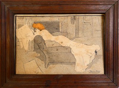 an old picture of a woman laying on a couch in a living room