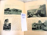 an open book with a picture of a castle on it