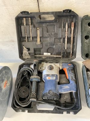 a box with tools in it sitting on a table