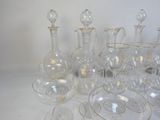 a lot of glass items that are sitting on a table