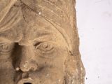 a statue of a woman with a surprised look on her face
