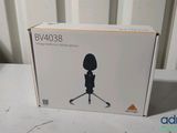a box with a picture of a person standing on a tripod