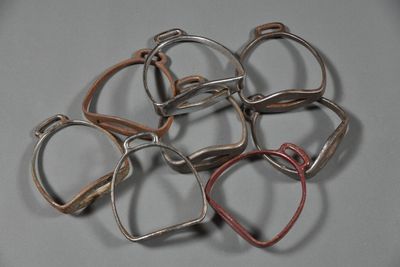 five pairs of glasses sitting on top of a table