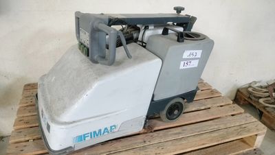 a machine that is sitting on a pallet in a room