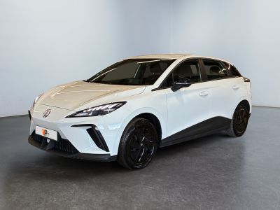 the white toyota c - hr is parked in a large room