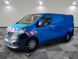 the blue van is parked on a checkered tile floor