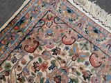 an image of a cat laying on top of a rug on the floor