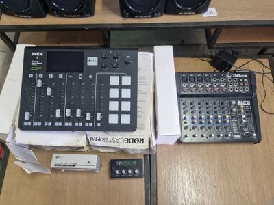many different types of audio equipment on the table