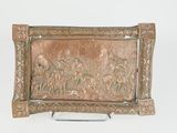 carvings of people and animals on a wooden plaque on a stand