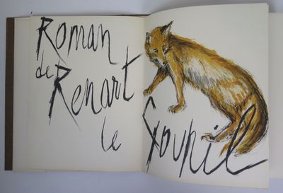 an open book with a drawing of a squirrel on it