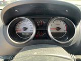 two gauges on the dashboard of a car