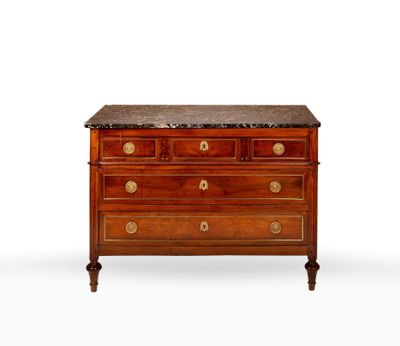 an antique chest of drawers with marble top