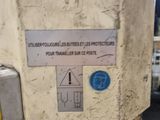 a sign on the side of a machine that is not working