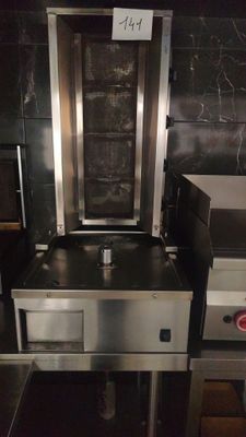 an image of a commercial kitchen with stainless steel appliances