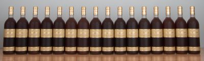 six bottles of wine lined up in a row on a table