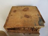 a small wooden box with a lid that has writing on it