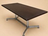 an image of a wooden table with metal legs on a beige background