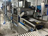 a conveyor belt in the middle of a factory