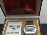 a watch that is in a box on a table